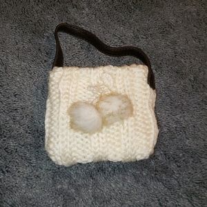Small white child's purse
